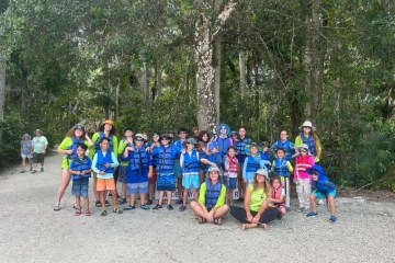 a group of people posing for the camera